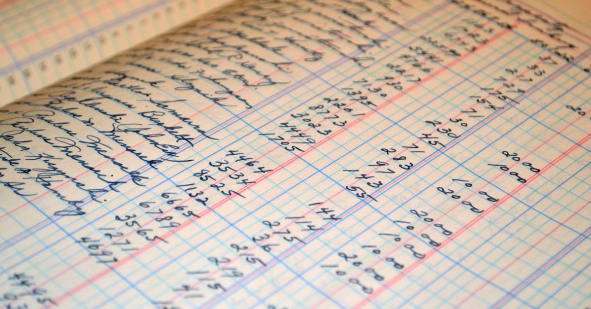 Handwritten ledger used to represent an auditable editorial archive