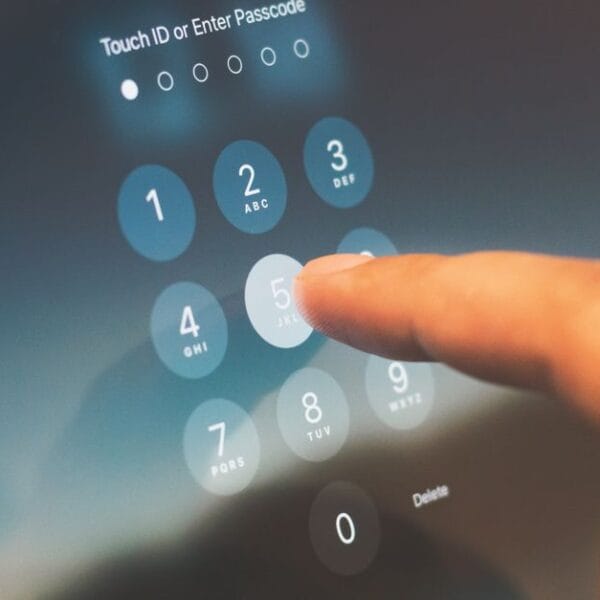 Finger verifying information on a smartphone security screen
