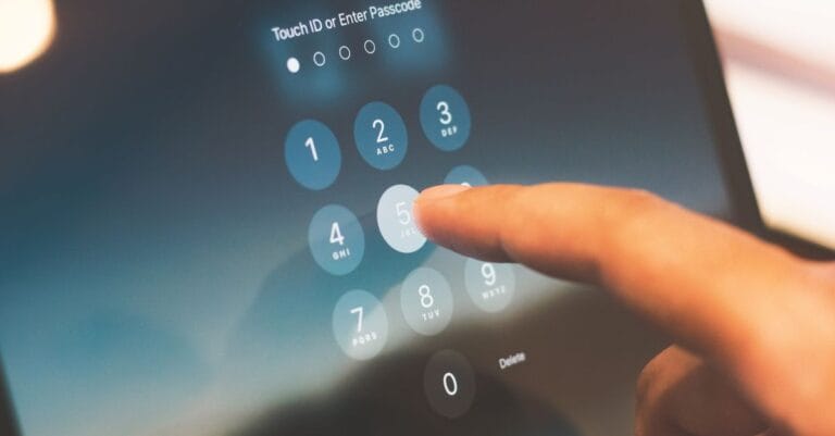 Finger verifying information on a smartphone security screen
