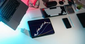 Financial analytics displayed across devices on a modern research desk