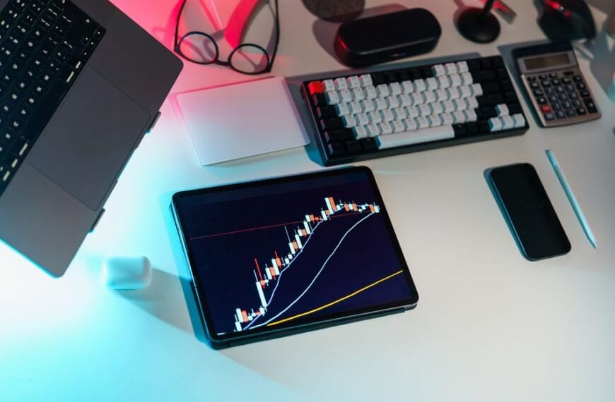 Financial analytics displayed across devices on a modern research desk