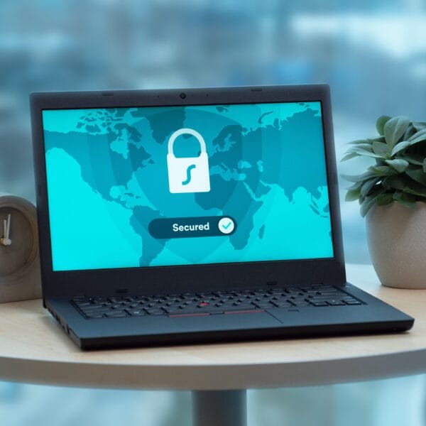 Laptop displaying a security lock icon to illustrate read-only API key permissions and data access risk