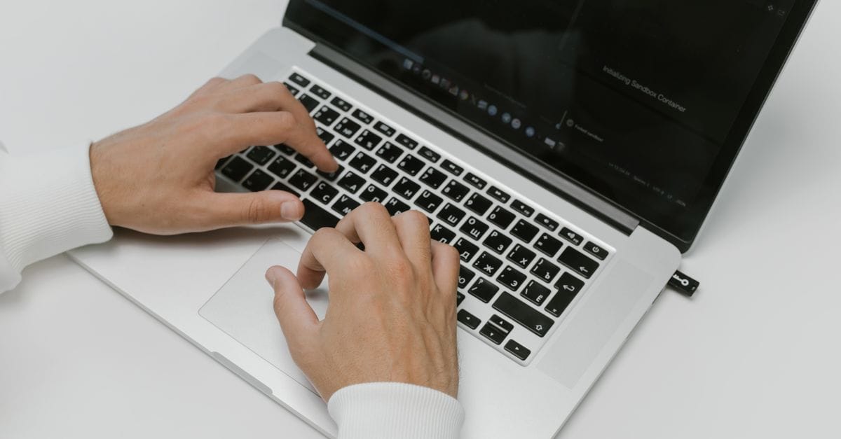 Laptop and USB device during a software maintenance workflow