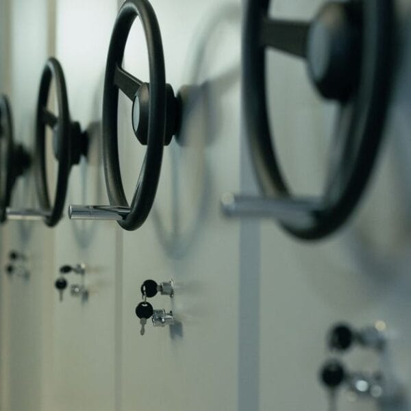 Multiple safes and keys representing separate access controls