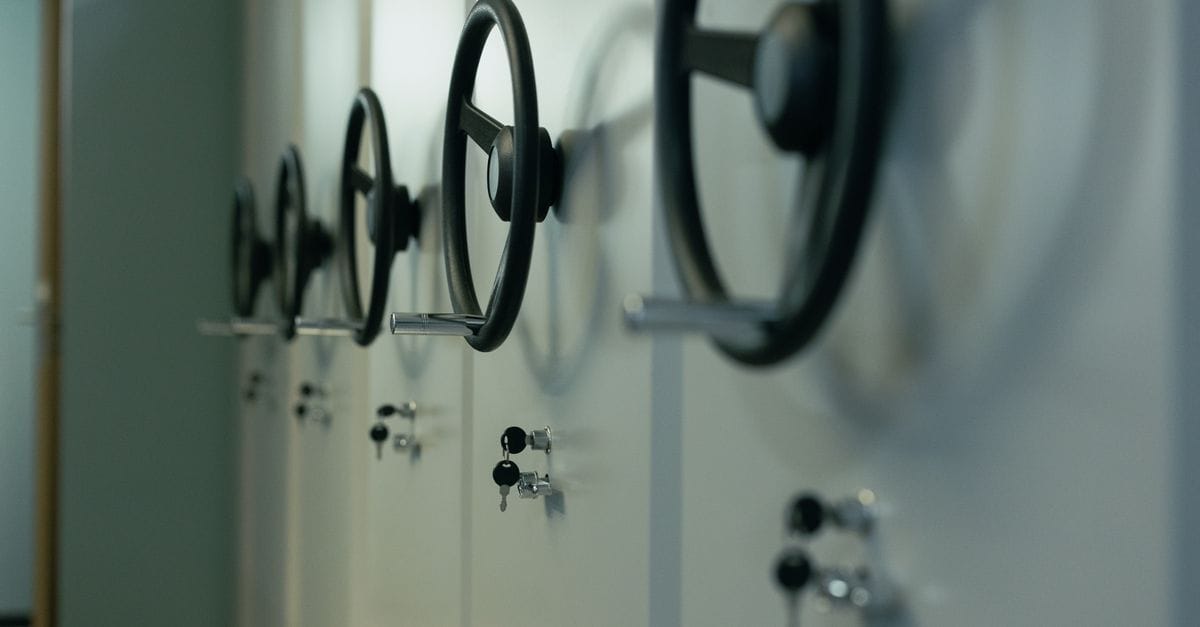 Multiple safes and keys representing separate access controls